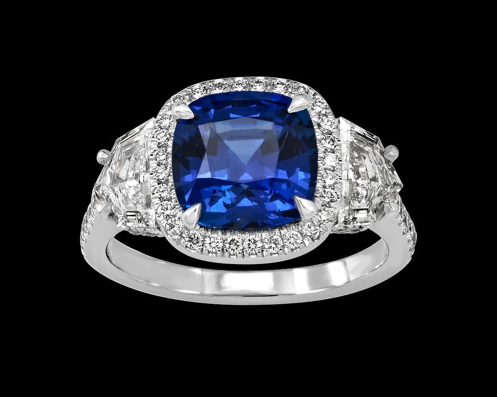 The Alexia Sapphire Halo Three Stone Ring