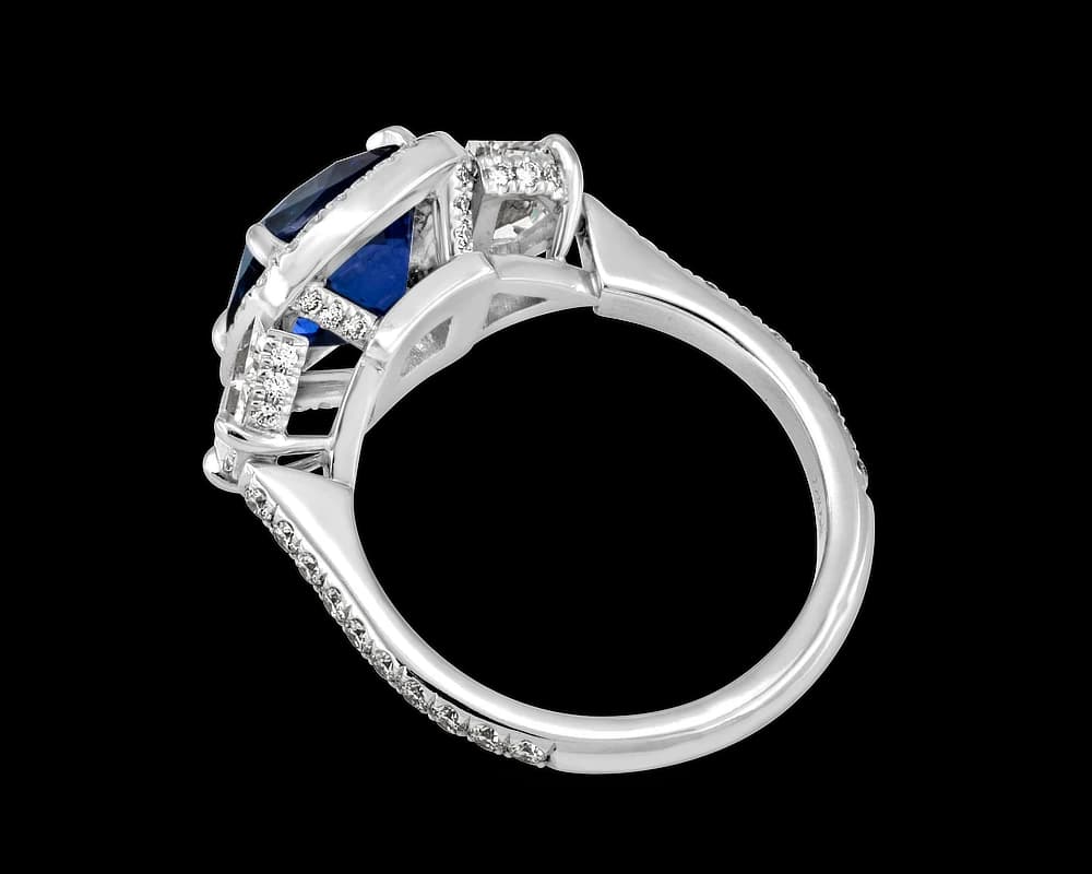 The Alexia Sapphire Halo Three Stone Ring