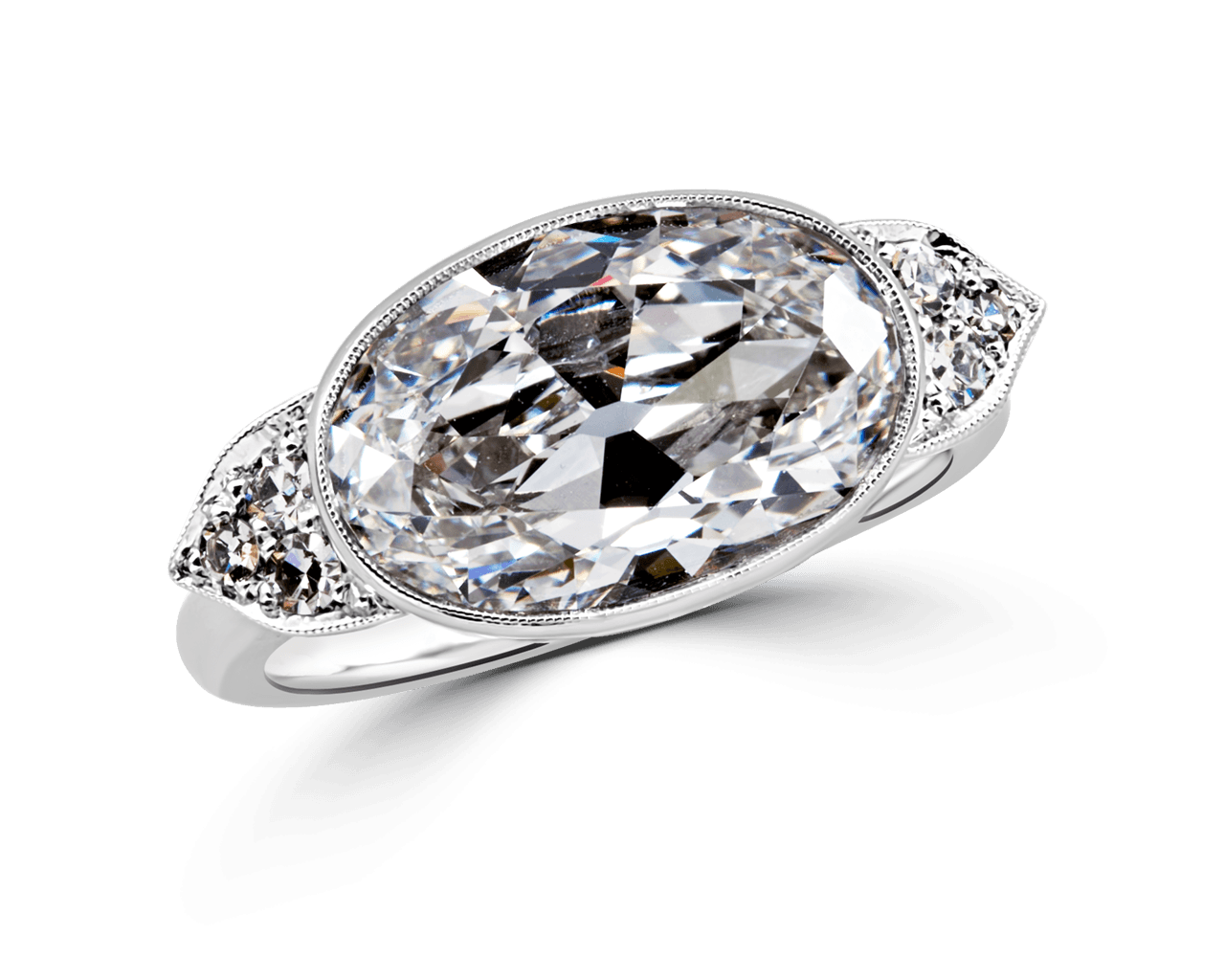 Vintage Bezel set Oval Side Stone Ring