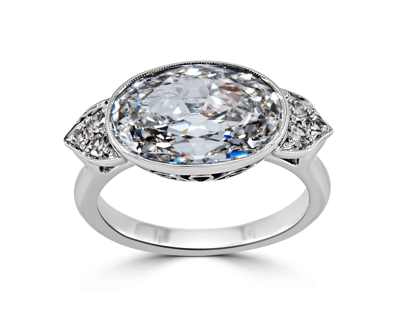 Vintage Bezel set Oval Side Stone Ring