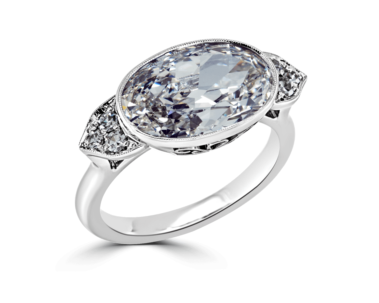 Vintage Bezel set Oval Side Stone Ring