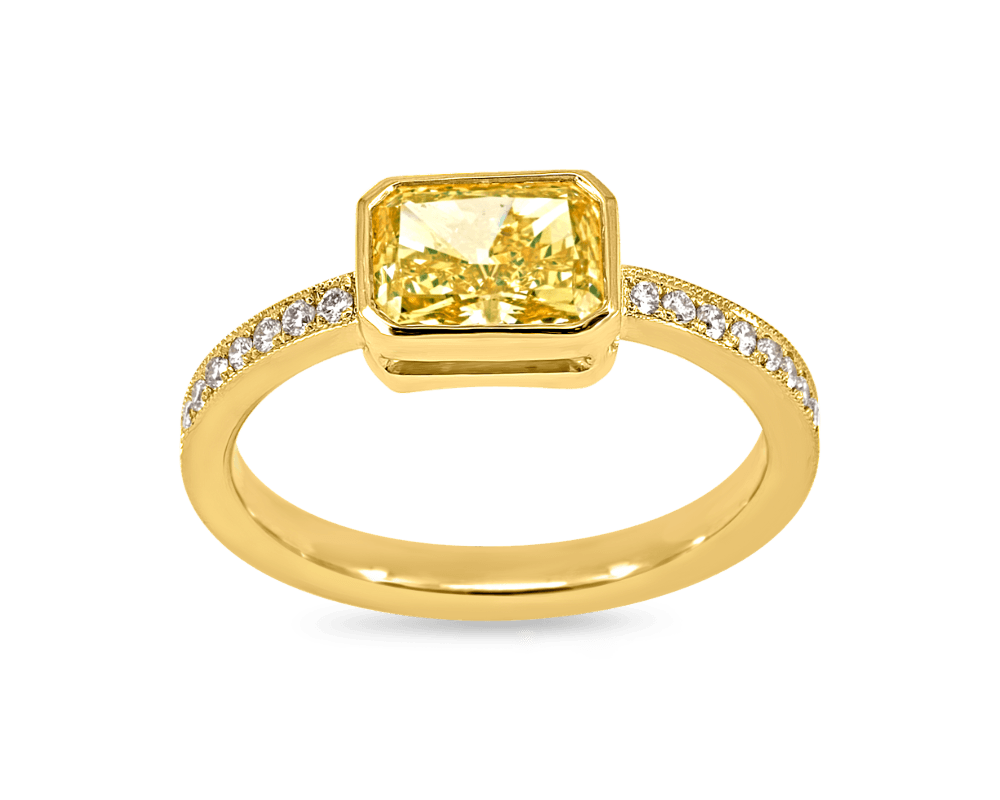 Fancy Yellow Bezel Set Pave Ring