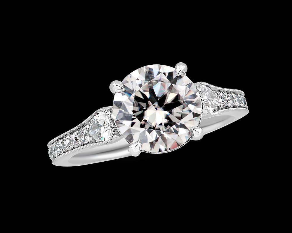 The Karissa Solitaire with Pear Shaped Pave Band