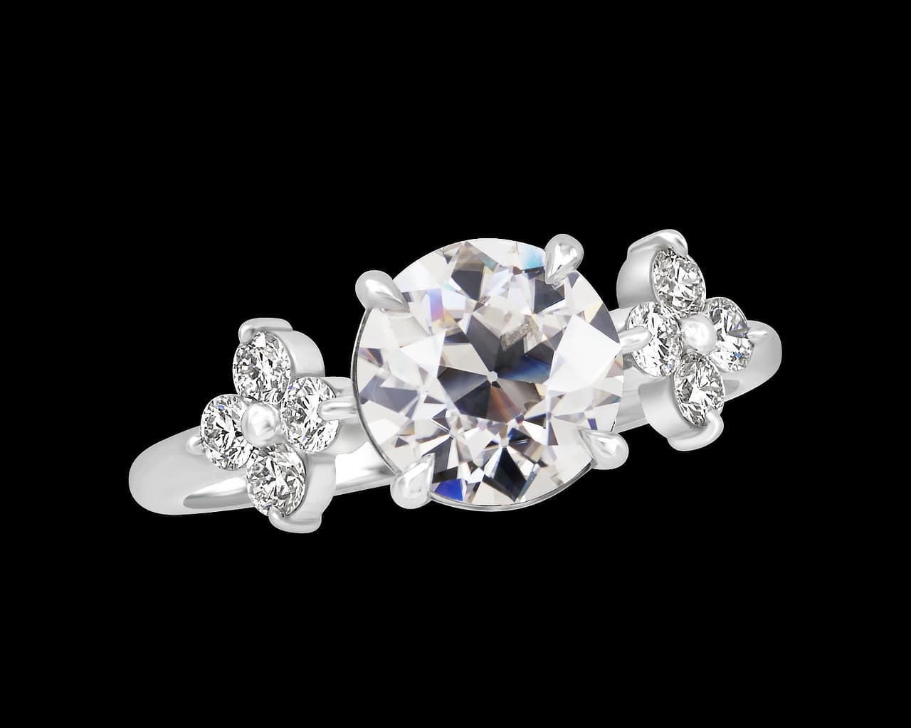 Ring With Quad Set Accent Diamonds