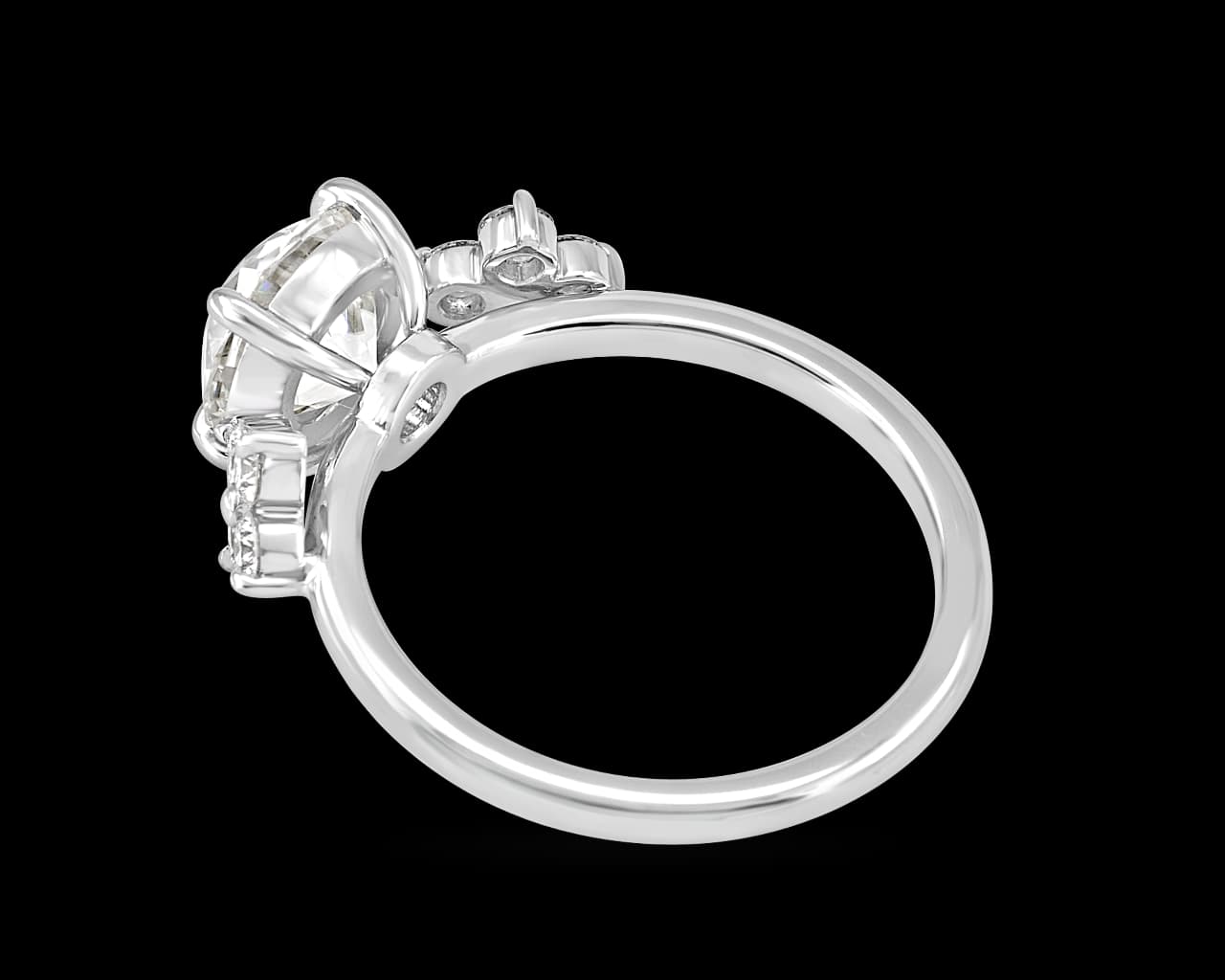 Ring With Quad Set Accent Diamonds