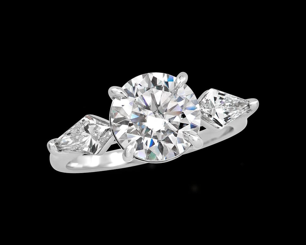 Round and Kite Shape Three Stone Ring