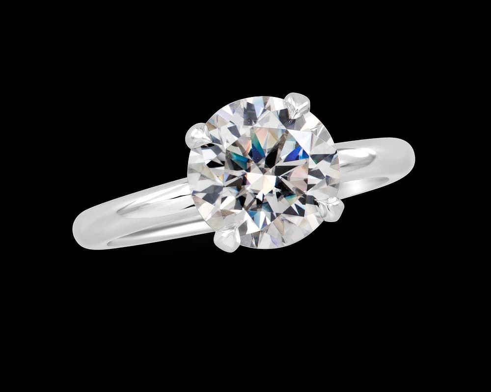 Round Solitaire with Pave set Under Halo