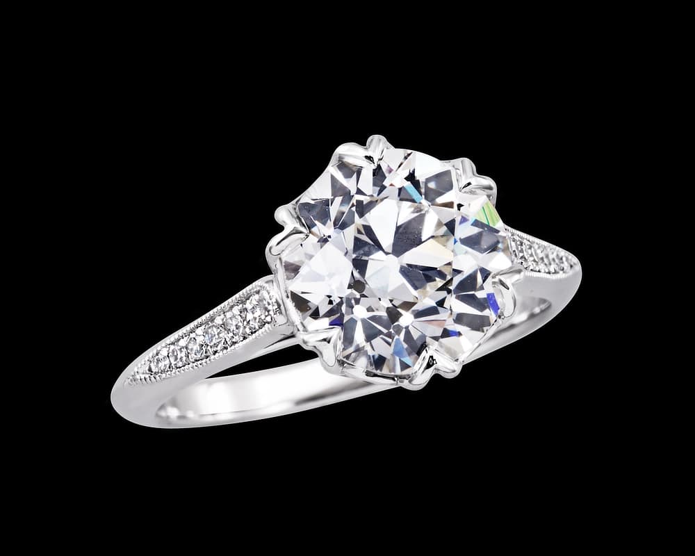 Adriana Solitaire with a Pave Set Cathedral Band