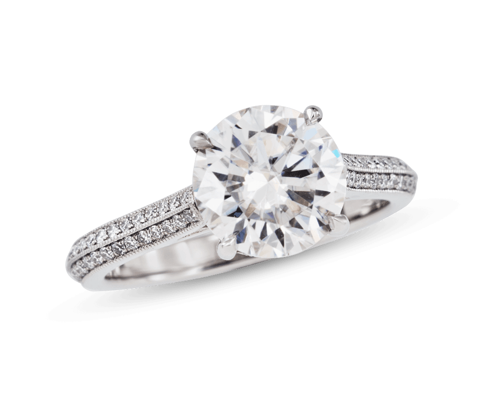 Solitaire with Knife Edge Pave Band