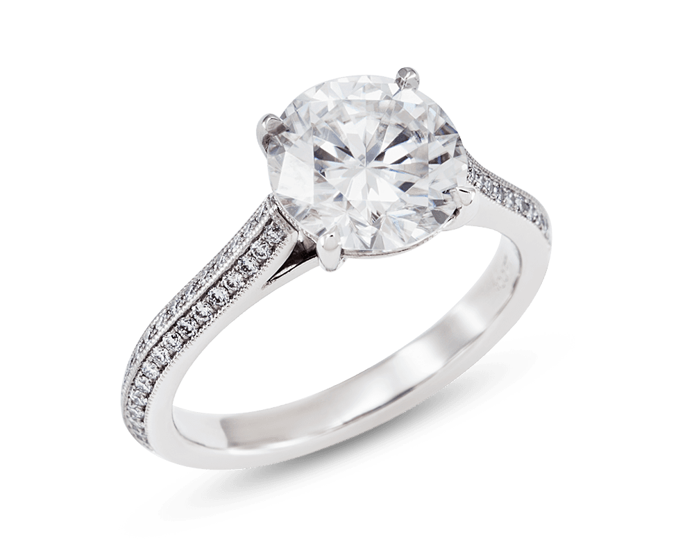 Solitaire with Knife Edge Pave Band