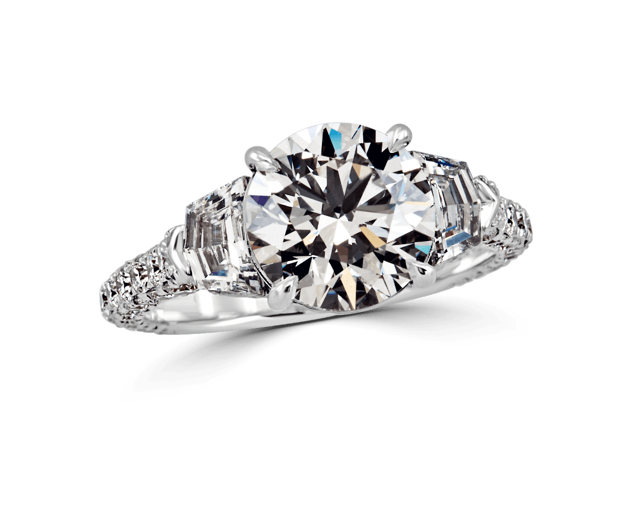 Round and Shield Cut Three Stone Ring