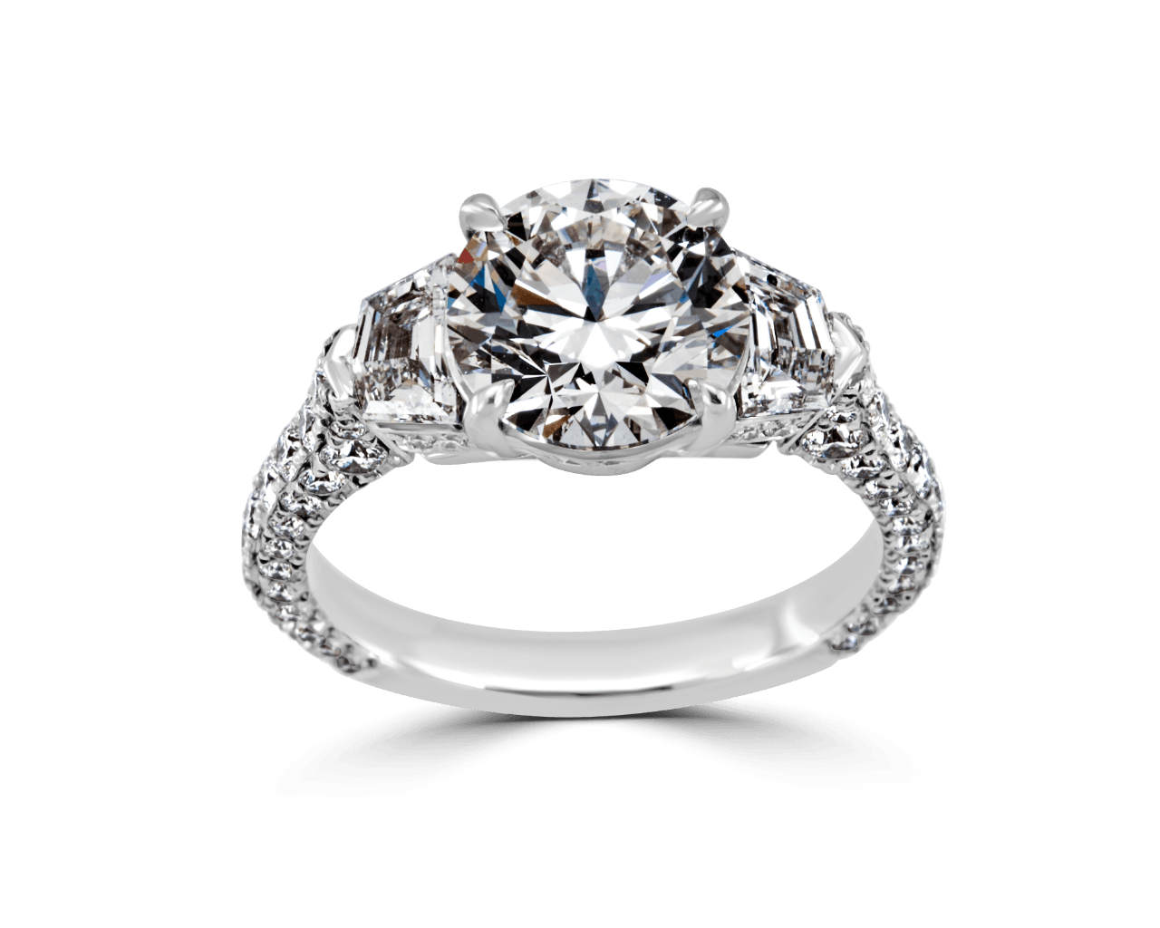Round and Shield Cut Three Stone Ring