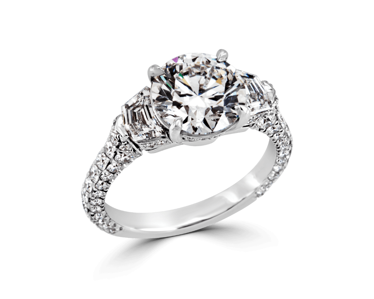 Round and Shield Cut Three Stone Ring