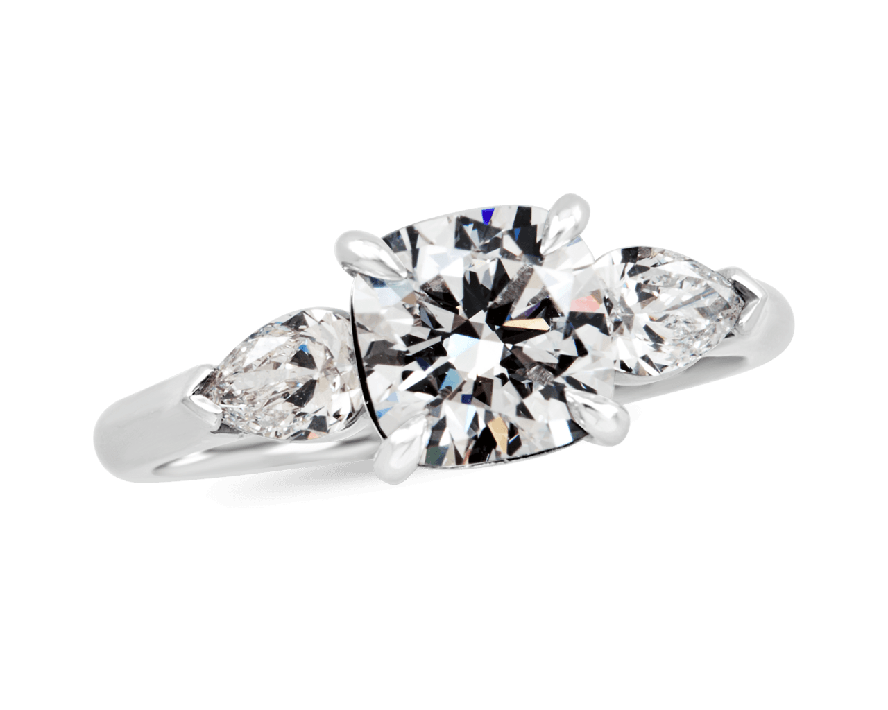 Cushion and Pear Shape Three Stone Ring