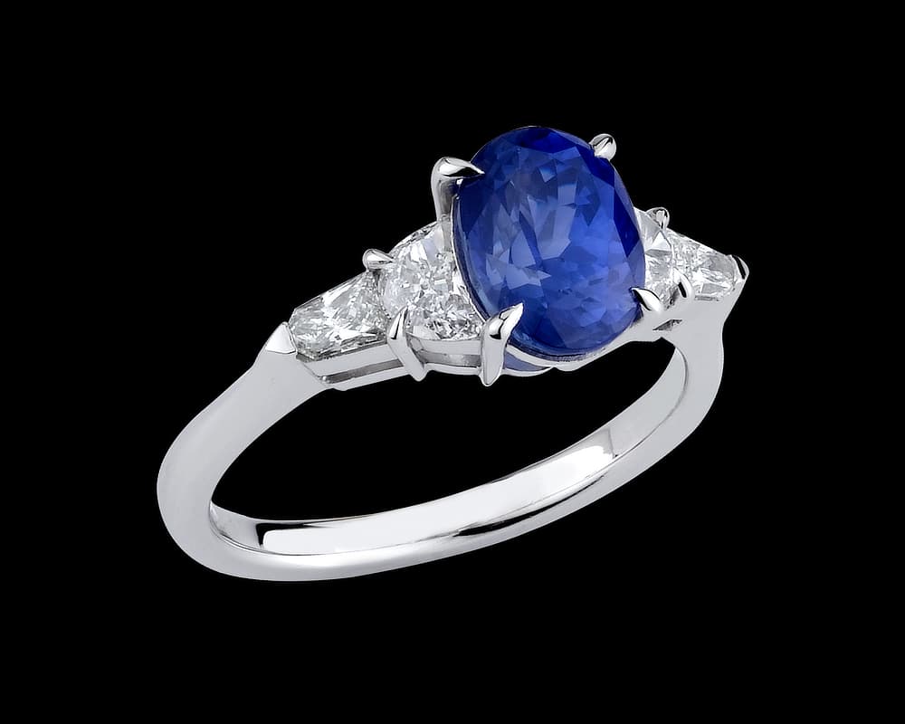Five Stone Solitaire with Oval Sapphire