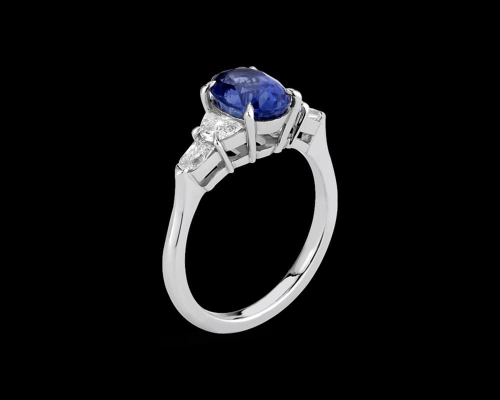 Five Stone Solitaire with Oval Sapphire